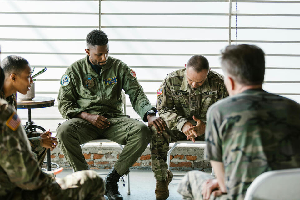 Photo by RDNE Stock project Military men Supporting Each Other. Solstice Transitions Psychology Services